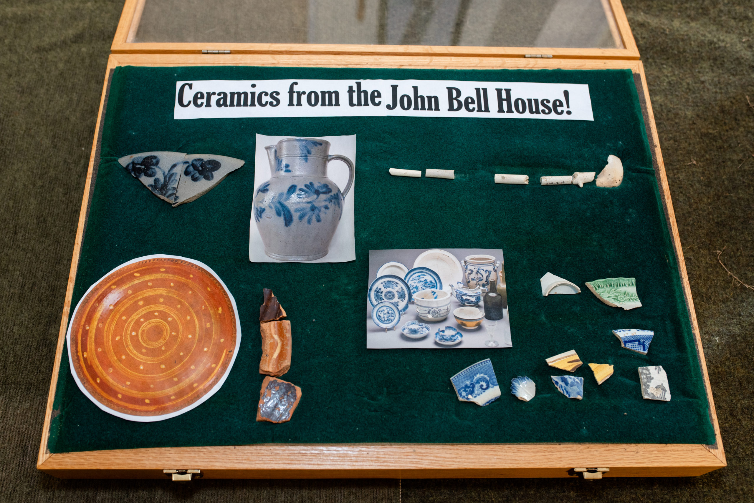 Display case of ceramic artifacts from the excavation site